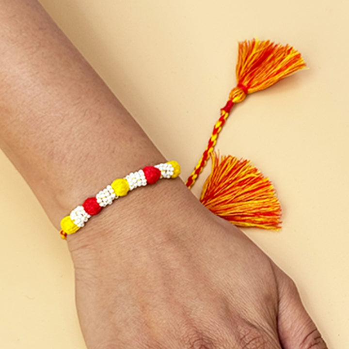 Handmade Reusable Red And Bright Yellow Beaded Patwa Rakhi For Brother