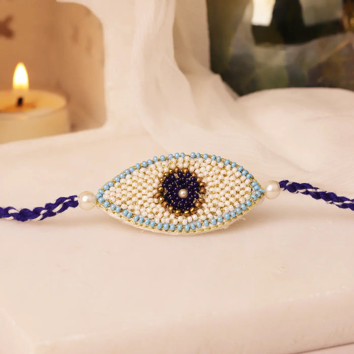 Handmade Beaded Pearl Evil Eye Rakhi With Roli Chawal