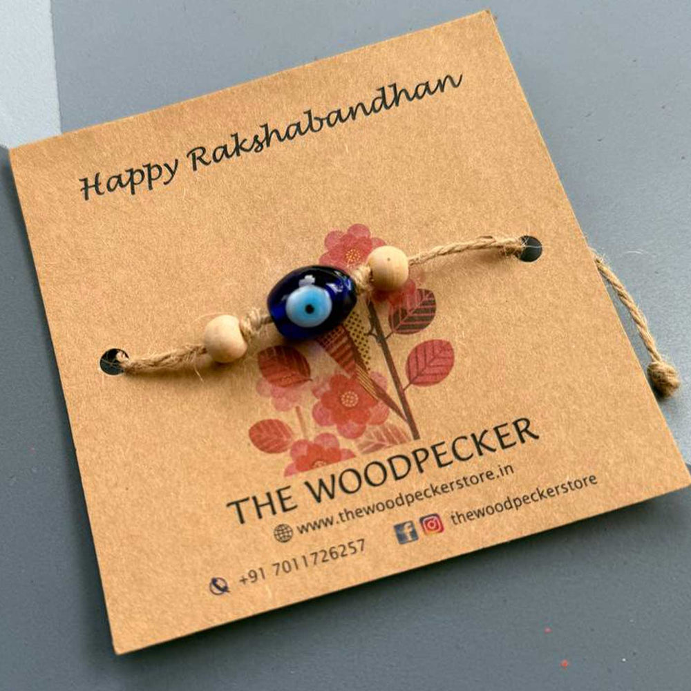 Personalized Hand Painted Evil Eye Rakhi With Roli Chawal - Angled Front View