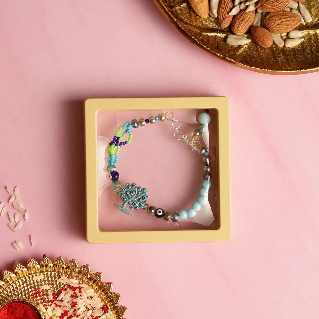 Handmade Beaded Tree Of Life Rakhi With Roli Chawal