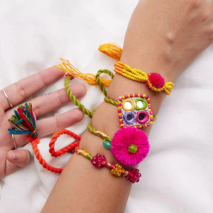4 pc Rakhi + Brass Thali Set | Premium Erika Pom Pom Rakhi Set with Roli Chawal