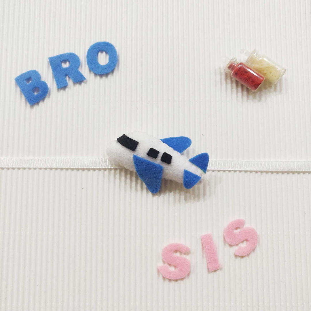 Handmade Plane Theme Felt Kids Rakhi With Roli Chawal - Airplane Clip with "BRO" and "SIS"