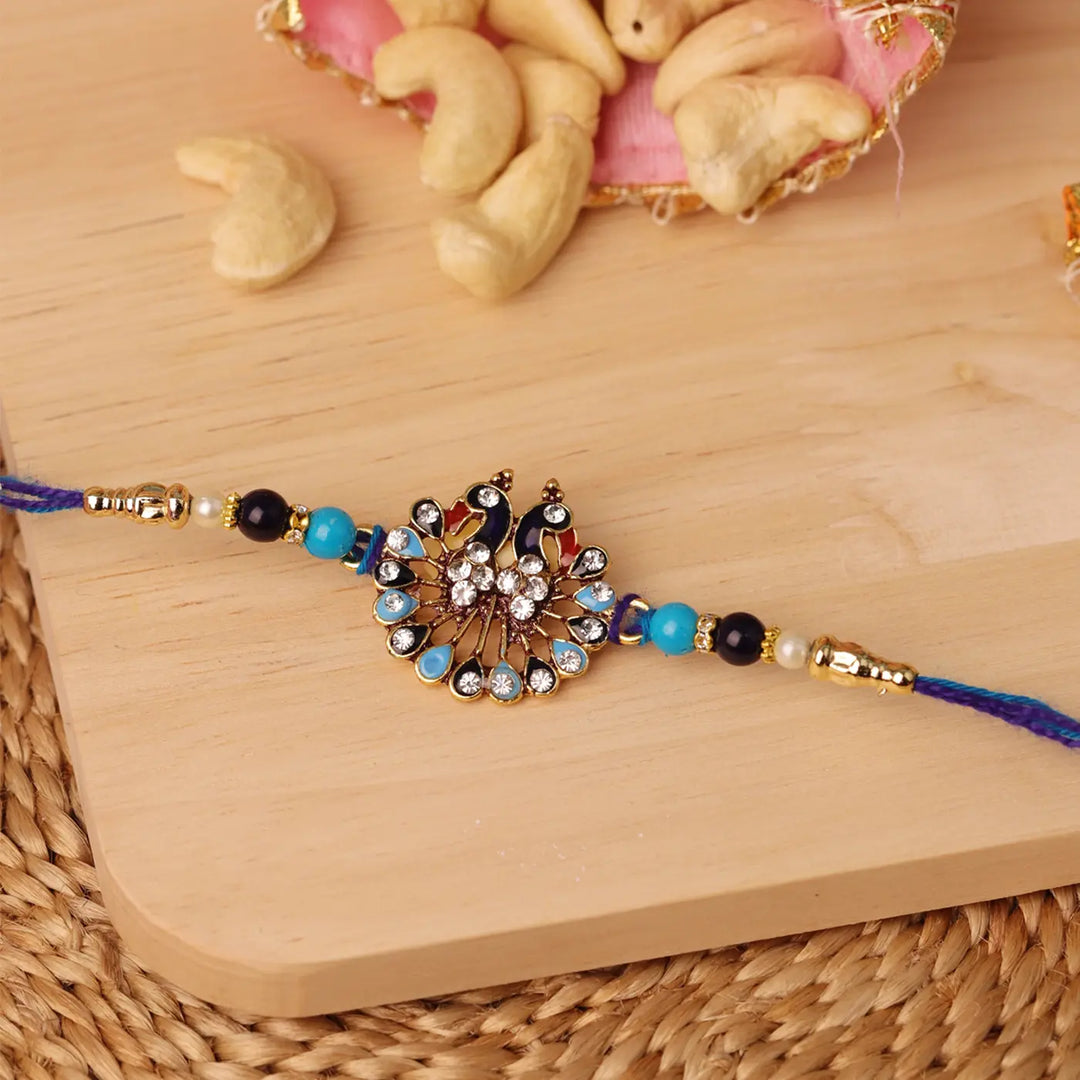 Handmade Stone Embellished Peacock Rakhi With Roli Chawal