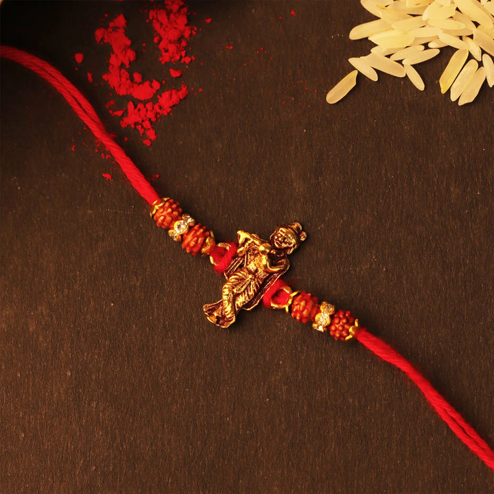 Handmade Krishna Theme Rakhi With Roli Chawal