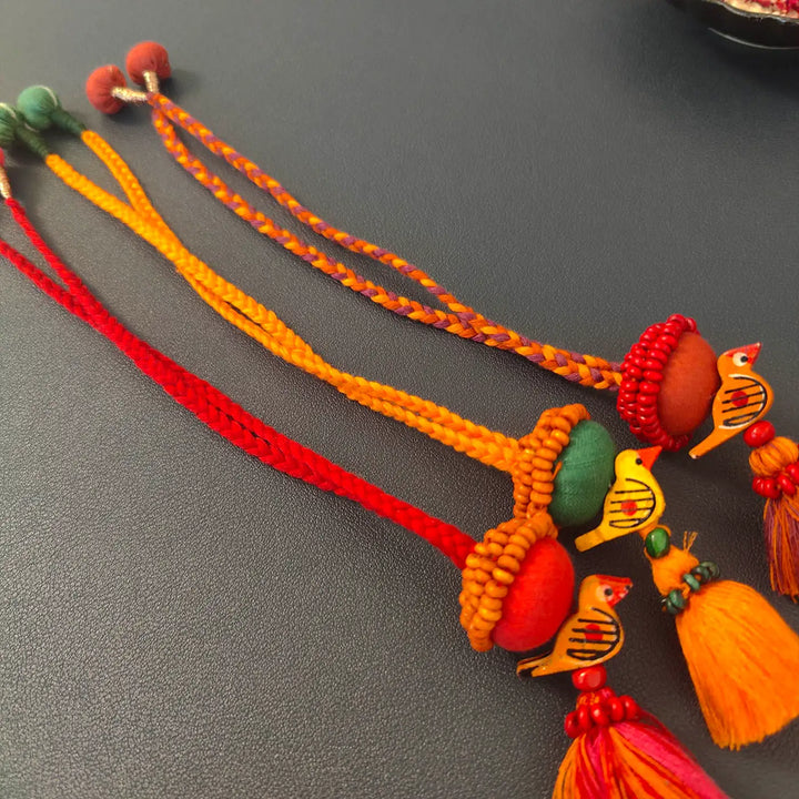 Handmade Beaded Multicolour Bird Lumba Rakhi For Bhabhi With Roli Chawal | Set Of 3