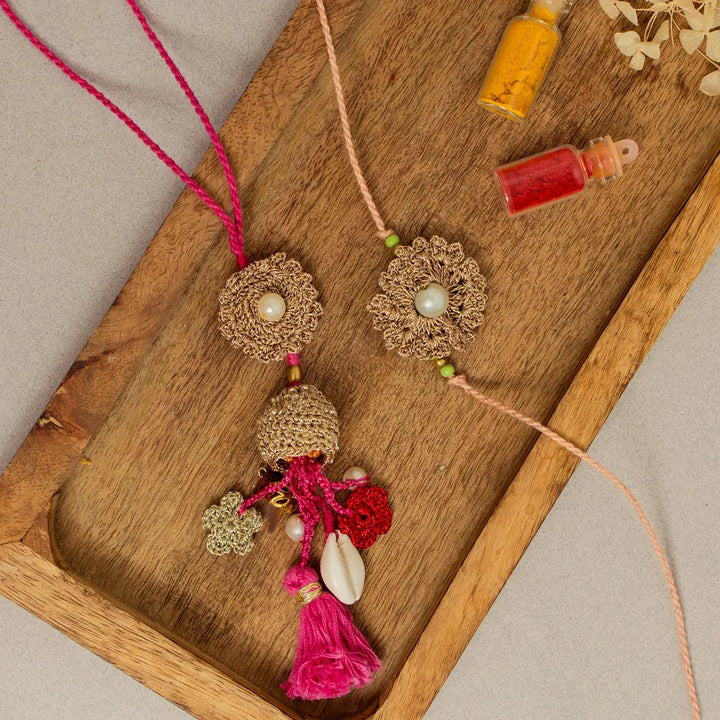 Handmade Crochet Moti Jhalar Bhaiya Bhabhi Rakhi With Roli Chawal Set Of 2 - Detailed view of tassels with jars