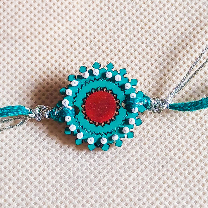 Handmade Turquoise Flower Shape Beads Wooden Rakhi With Roli Chawal For Brother - Close-up Detail View