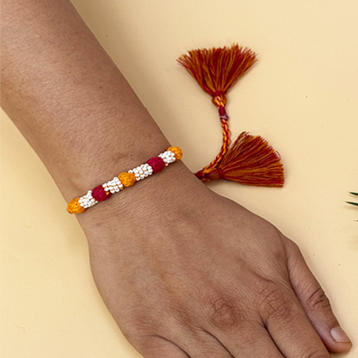 Handmade Reusable Maroon And Yellow Beaded Patwa Rakhi For Brother