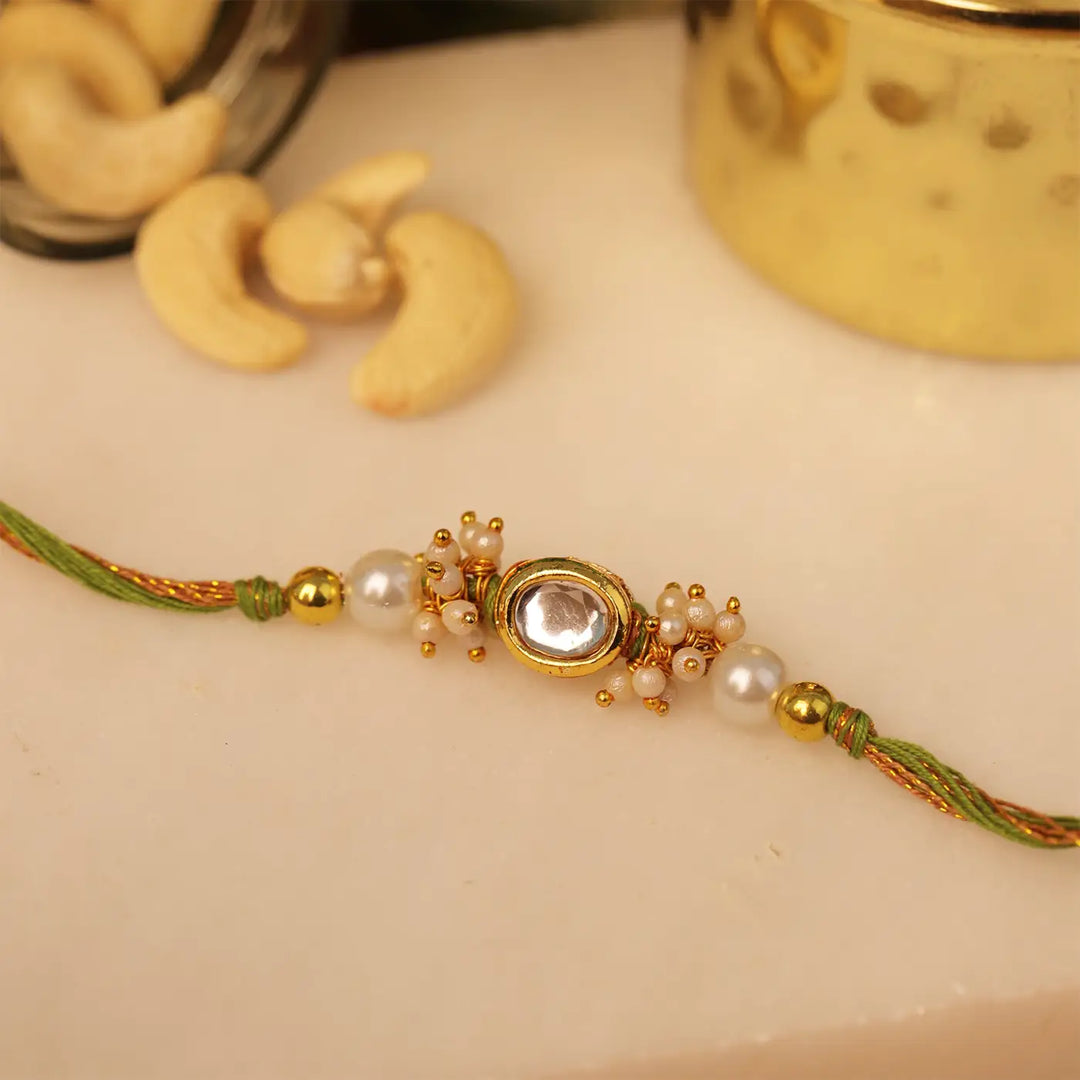 Handmade Solitaire Kundan Rakhi With Roli Chawal