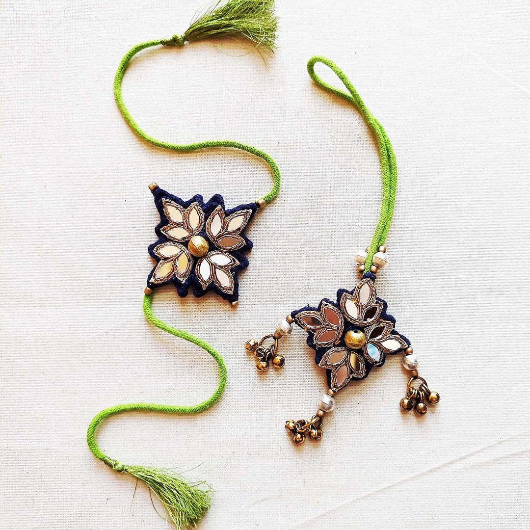 Handmade Mirror Work And Ghungroo Blue Bhaiya Bhabhi Rakhi With Roli Chawal Set Of 2 - Two Product Pieces Laid Flat (6)
