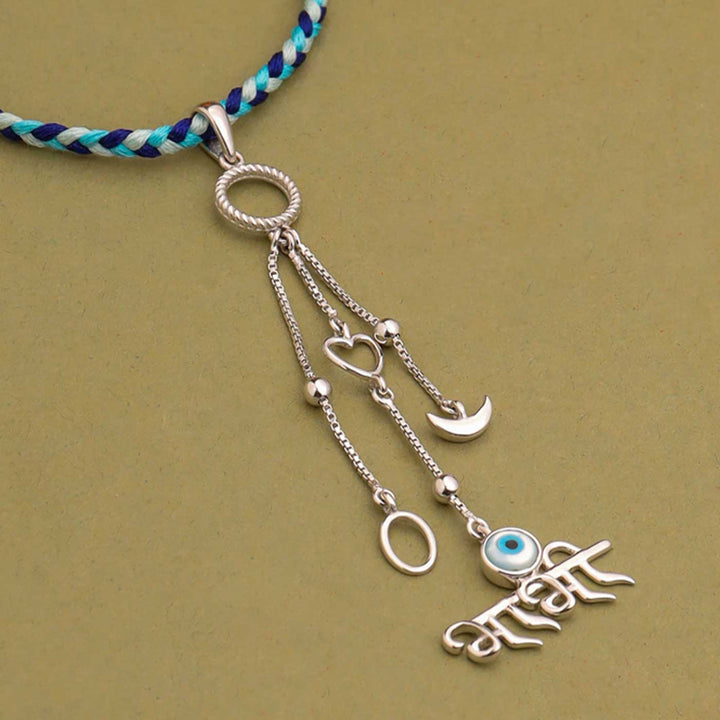 Handmade Evil Eye Design Silver Lumba Rakhi For Bhabhi 1 - Close-up of Pendant Details
