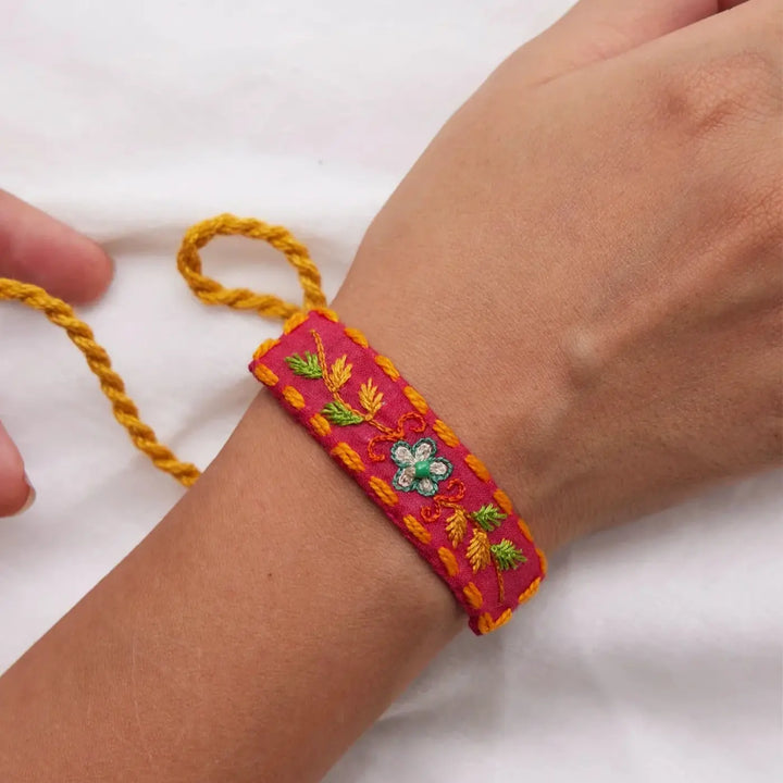 2 pc Rakhi + Brass Thali Set | Premium Chikki Embroidered Pom Pom Rakhi Set with Roli Chawal