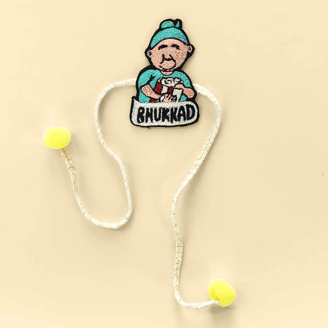 Handmade Bhukkad Pom Pom Felt Rakhi For Brother - Flat Lay Front View
