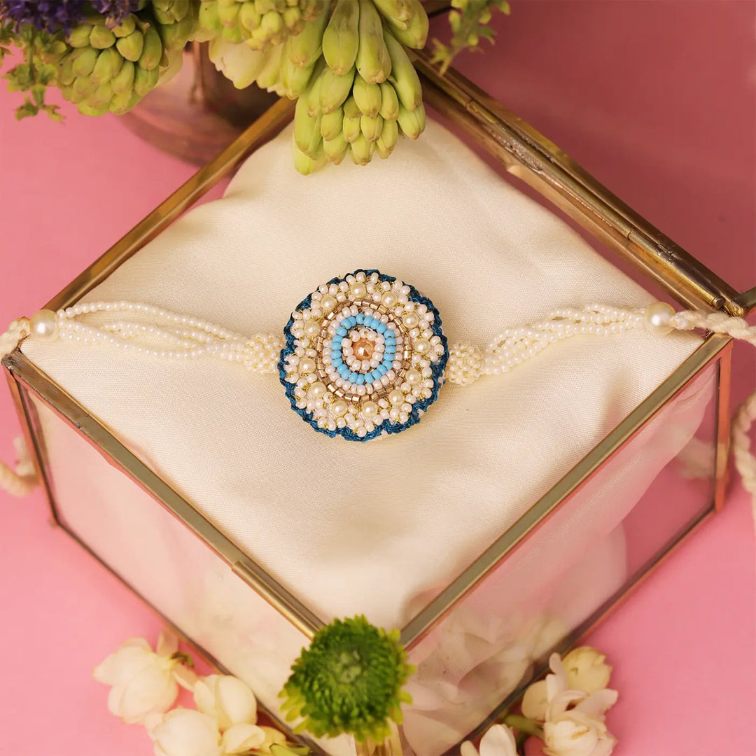 Handmade Beaded White & Blue Floral Rakhi With Roli Chawal