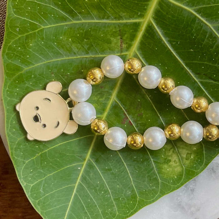 Handmade Bear Design Metal Kids Rakhi - Close-up of Jewelry Detail