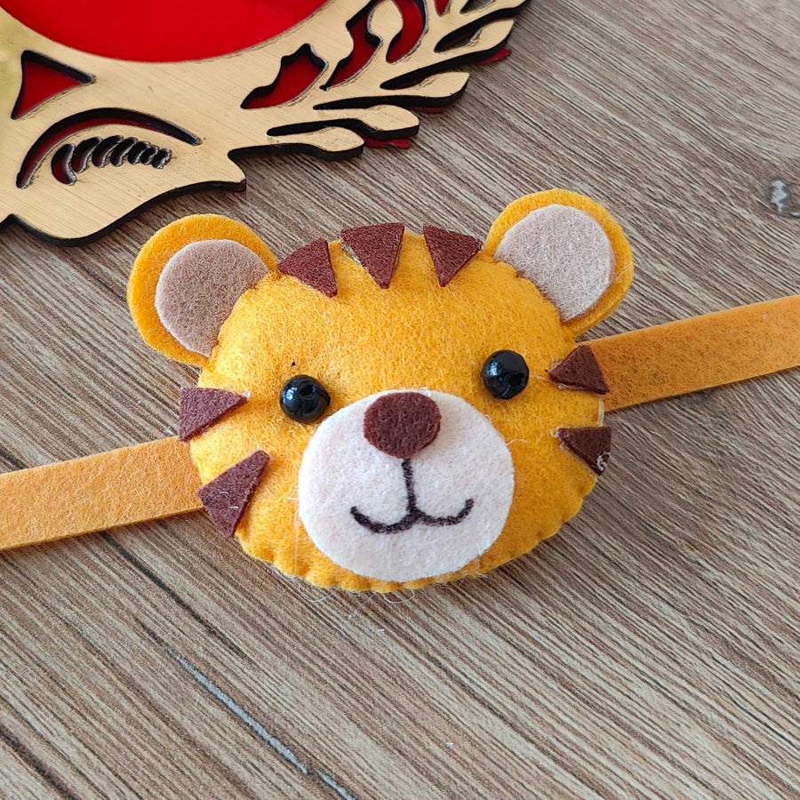 Handmade Tiger Theme Felt Kids Rakhi With Roli Chawal - Close-up of front face detail