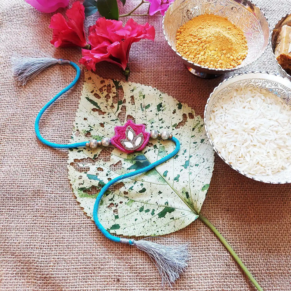 Handmade Mirror Work Lotus Rakhi With Roli Chawal - Styled with Ritual Ingredients