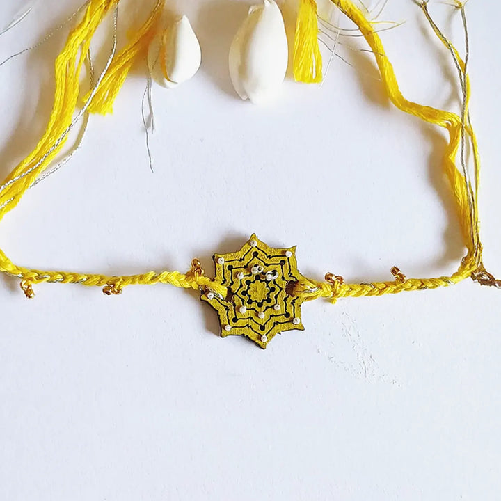 Handmade Yellow Ghungroo Shell & Beads Wooden Lumba Rakhi For Bhabhi With Roli Chawal