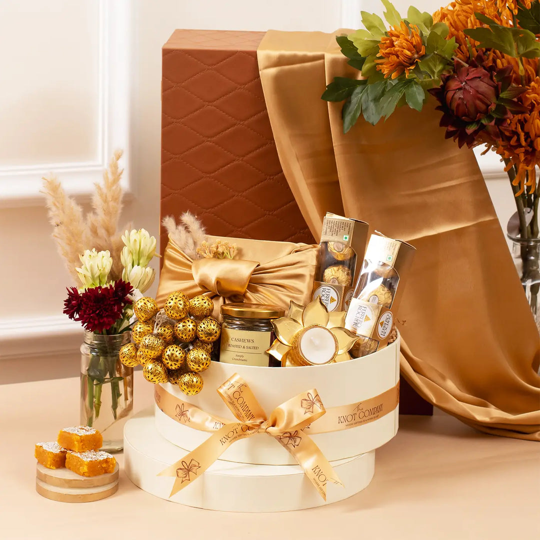 Golden Gleam of Diwali Gift Hamper | Includes 1 Fairy Light, 1 Cashews Jar, 1 Lotus Tealight Holder, 1 Kaju Katli, 2 Ferrero Rocher Boxes, 1 Gift Box