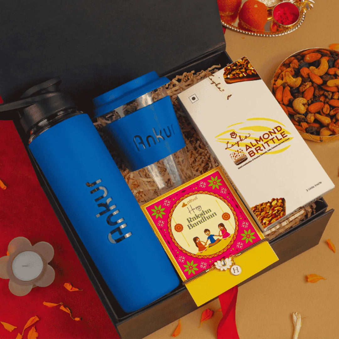 Personalized Sip In Style Rakhi Hamper | Includes 1 Bottle, 1 Coffee Mug, 1 Almond Brittle, 1 Rakhi & 1 Greeting Card
