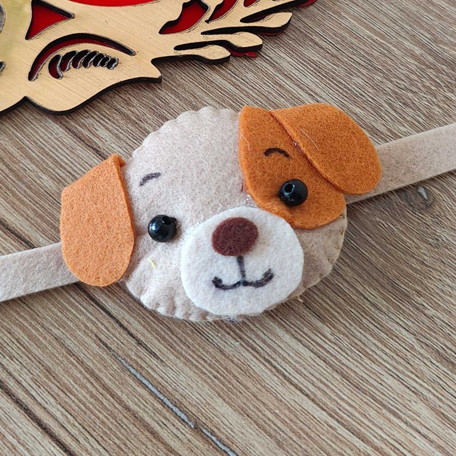 Handmade Dog Theme Felt Kids Rakhi With Roli Chawal - Close-up of dog face accessory