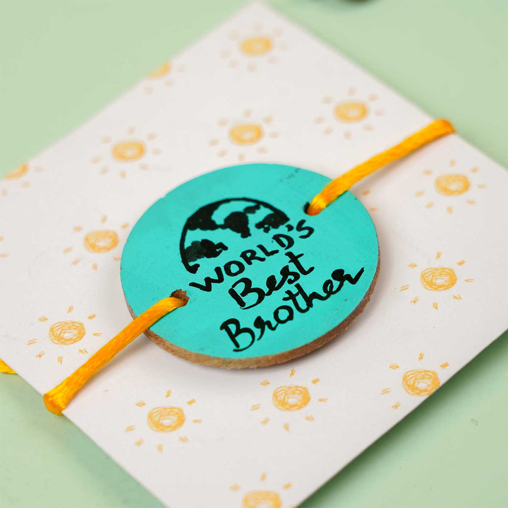 Personalized Hand Painted Worlds Best Brother Wooden Rakhi With Roli Chawal - Front View on Display Card