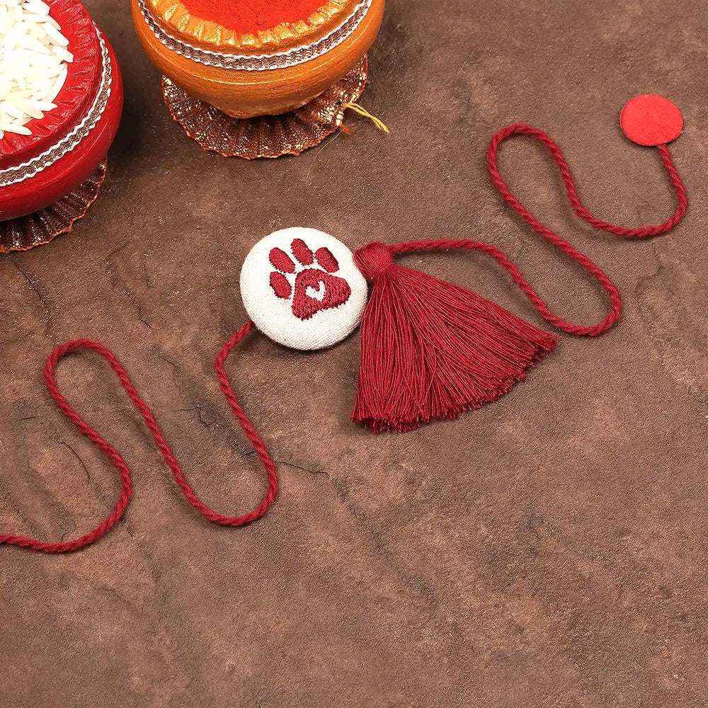Hand Embroidered Paw Rakhi With Roli Chawal For Pets - Full length with ritual items