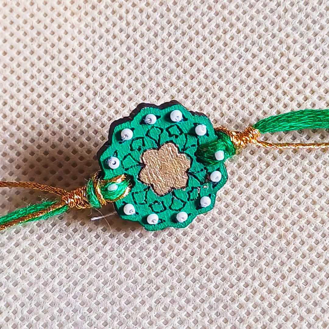 Handmade Green Flower Shape Beads Wooden Rakhi With Roli Chawal For Brother - Close-up Detailing Shot