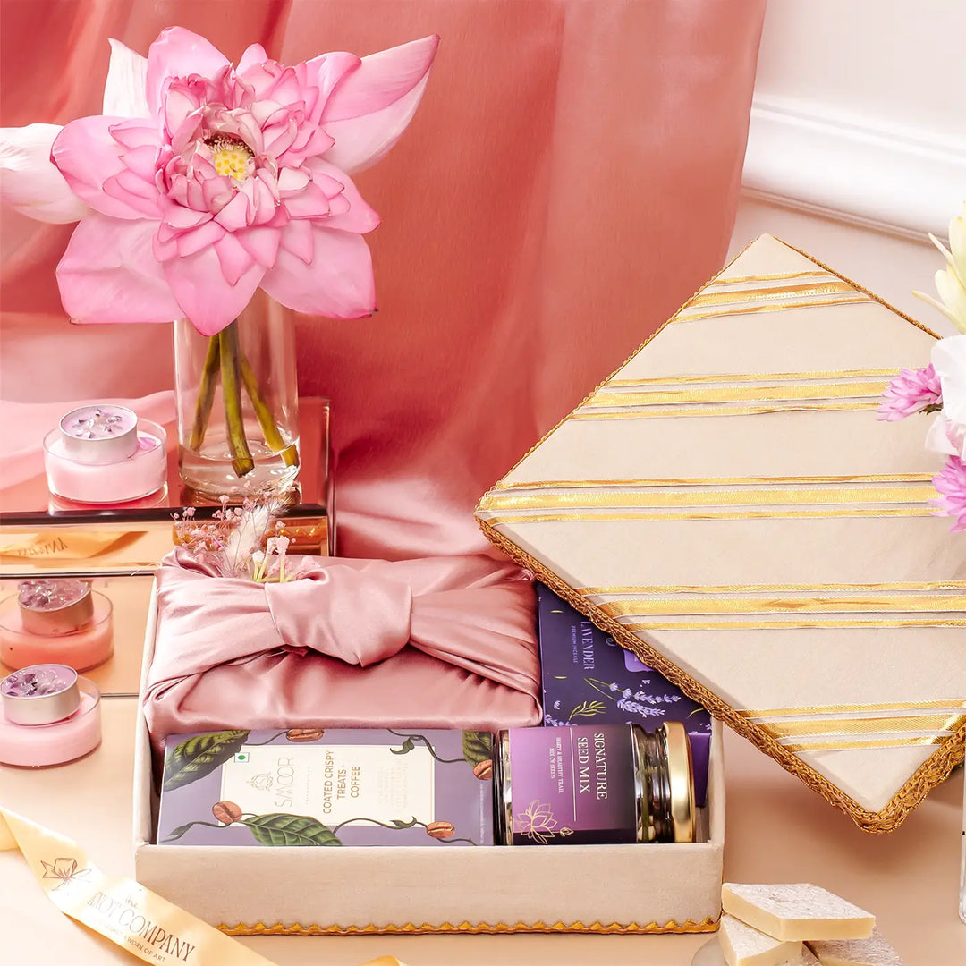 Festive Limelight in Lilac Gift Hamper | Includes 1 Kaju Katli Box, 1 Lavender Dhoop Cones Box, 1 Smoor Rice Crisps, 1 Signature Seed Mix, 1 Gift Box