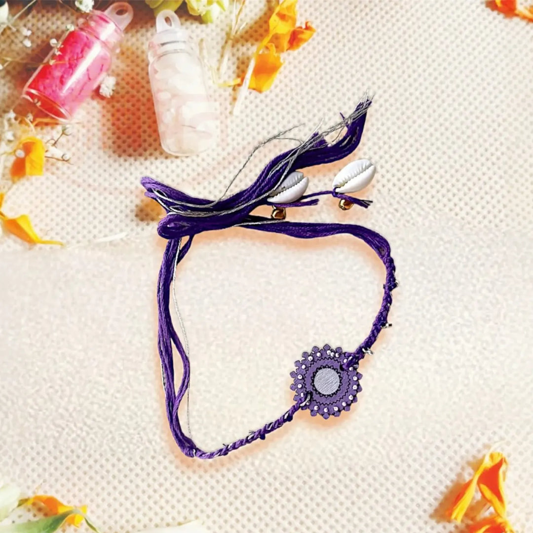 Handmade Purple Ghungroo, Shell & Beads Wooden Lumba Rakhi For Bhabhi With Roli Chawal