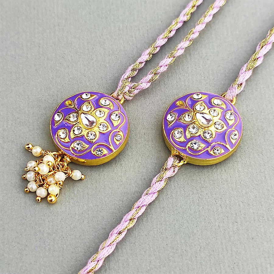 Handmade Meenakari Purple Buta Brass Bhaiya Bhabhi Rakhi With Roli Chawal - Front View of Rakhi Pair