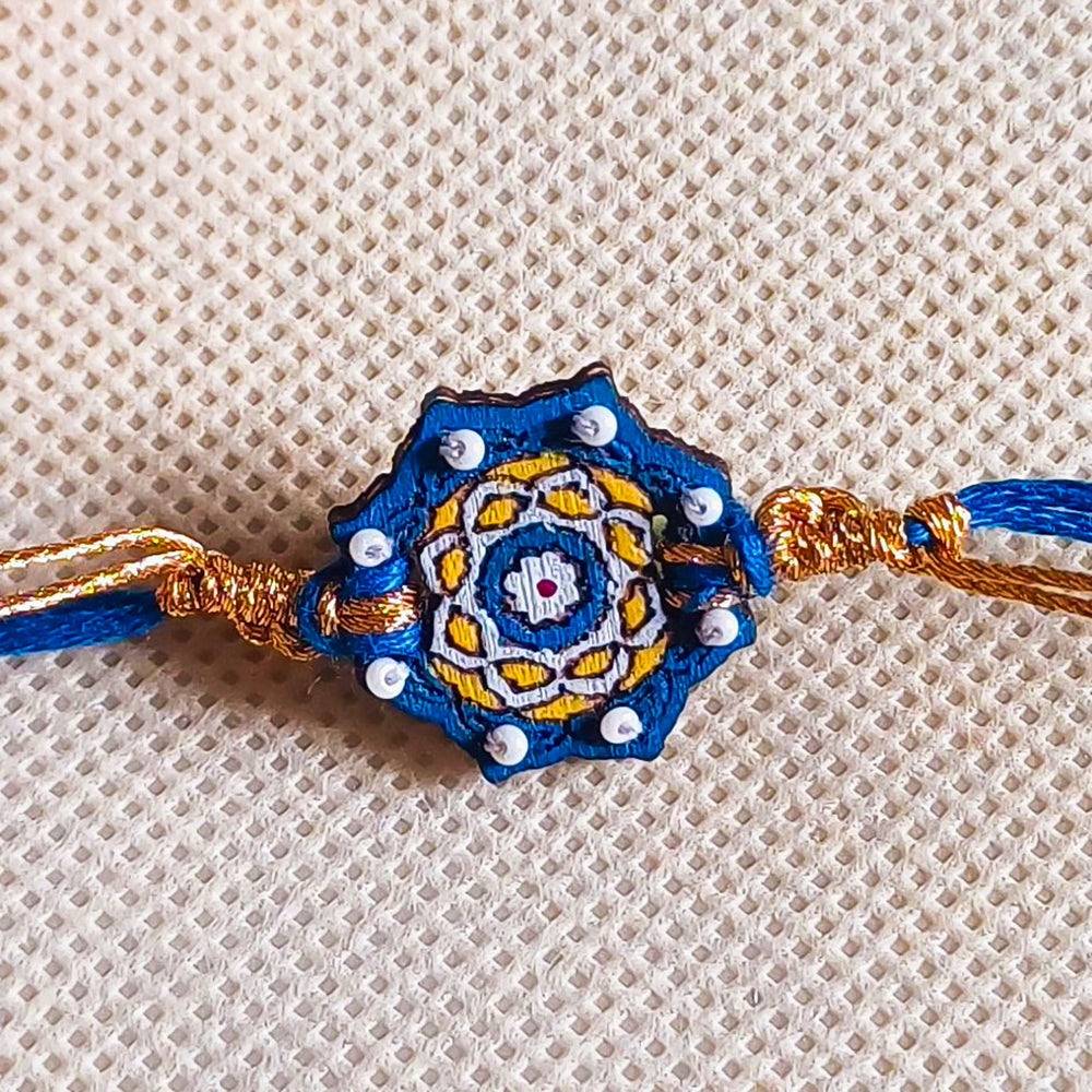 Handmade Embroidered Blue Jaipuri Beads Wooden Rakhi With Roli Chawal For Brother - Close-up of Design Details