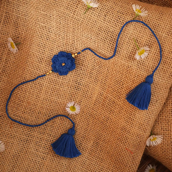 Handmade Crochet Blue Flower Rakhi With Roli Chawal - Blue Threaded Flower Extended View
