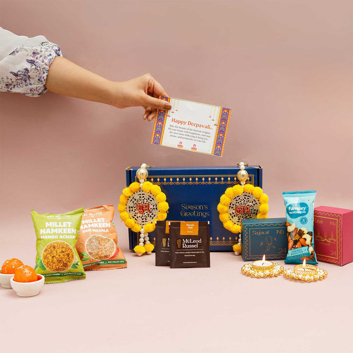 Handmade Prakash Gift Hamper | Includes 2 Tea Sachets, 2 Tea Light Holder, 2 Snacks, 1 Sajavat Shubh Labh, 1 Festive Card And 1 Box
