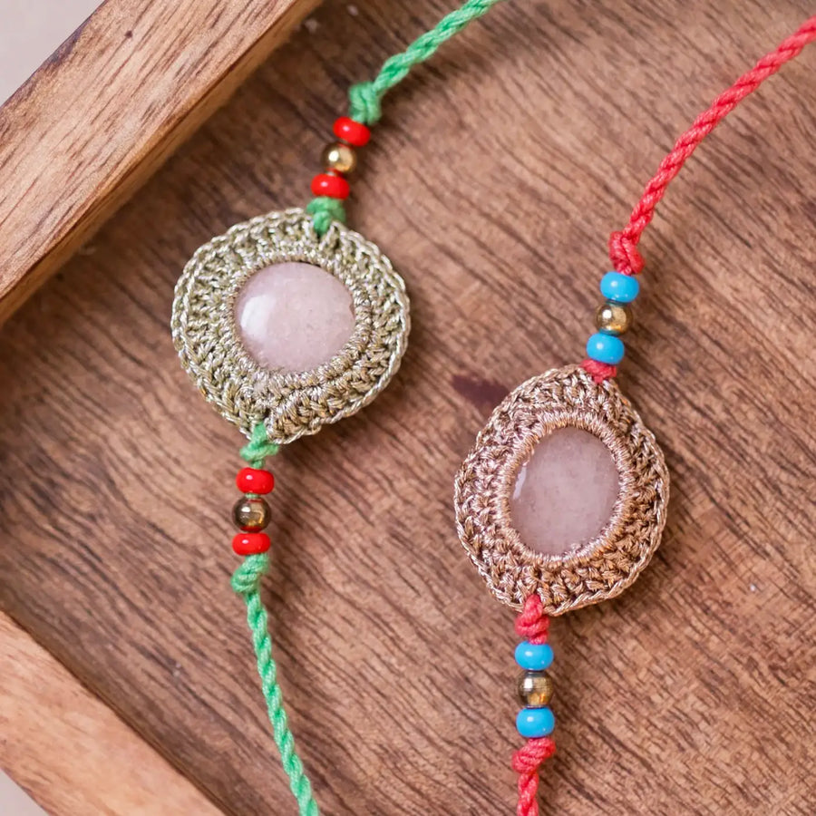 Handmade Crochet Moon Shine Rakhi With Roli Chawal Set Of 2 - Close-up View of Two Bracelets