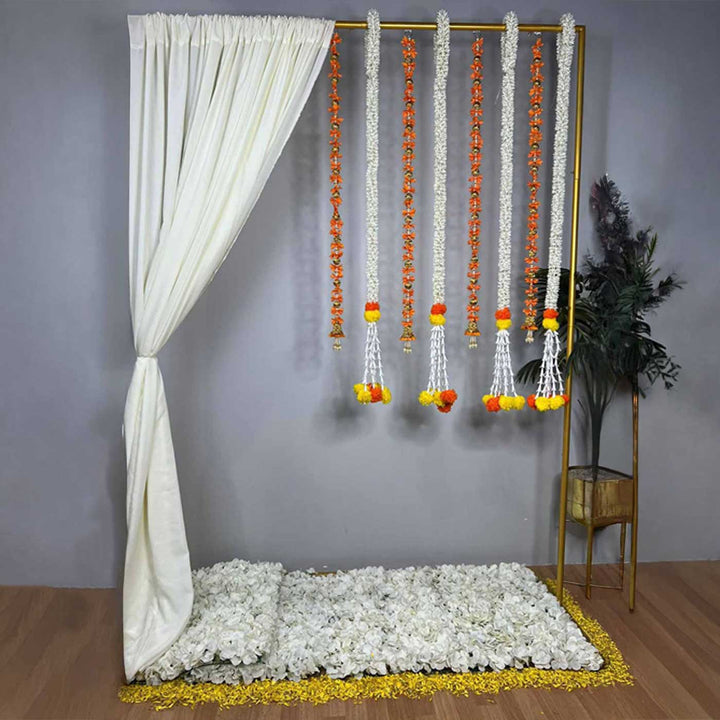 Traditional Orange Tassel Backdrop Decor Kit With Off-White Drape & Jasmine-Marigold Garlands