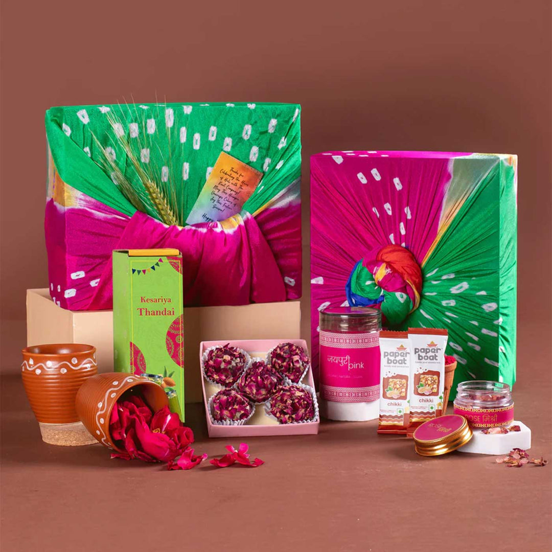 Sweet Hues of Holi Gift Hamper | Includes 1 Thandai, 2 Paper Boat Chikkis, 1 Pink Gulaal, 1 Rose Mishri, 1 Rose Dry Petals Laddoo Box, 2 Kulhads, 1 Classic Gift Box