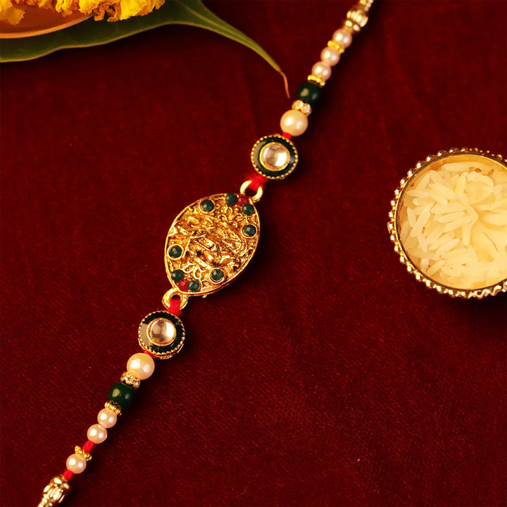 Handmade Golden Radha Krishna Rakhi With Roli Chawal