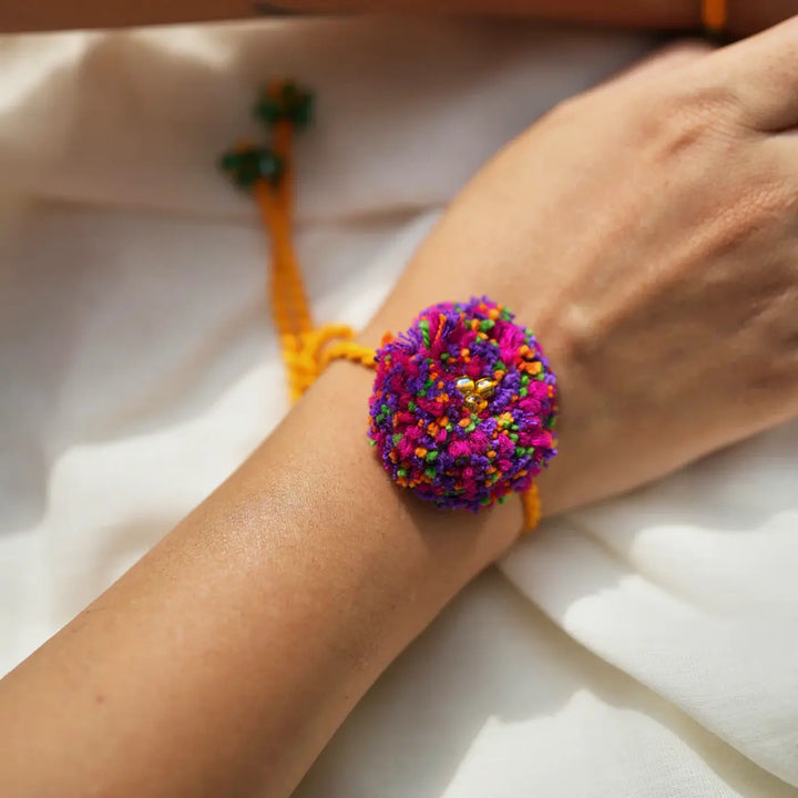 2 pc Rakhi + Brass Thali Set | Premium Barfi Beads & Pom Pom Rakhi Set with Roli Chawal