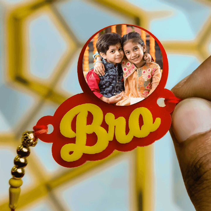 Photo Personalized Handmade Bro Theme Rudraksh Rakhi For Brother - Hand holding bracelet centerpiece