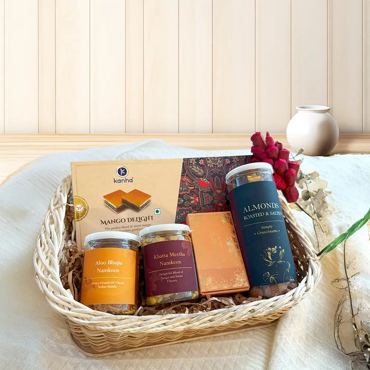 The Celebration Crate Diwali Gift Hamper | Includes 1 Mango Delight Box, 2 Namkeen Jars, 1 Almonds Jar, 1 Tilak Set, 1 Basket