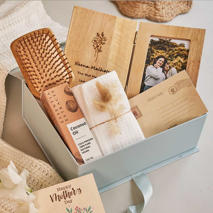 Photo Personalized Wrapped in Love for Mom Gift Box | Includes 1 Wooden Hair Brush, 1 Coconut Oil, 1 White Waffle Hand Towel, 1 Wooden Photo Frame, 1 Mother’s Day Postcard, 1 Peek-A-Boo Gift Box