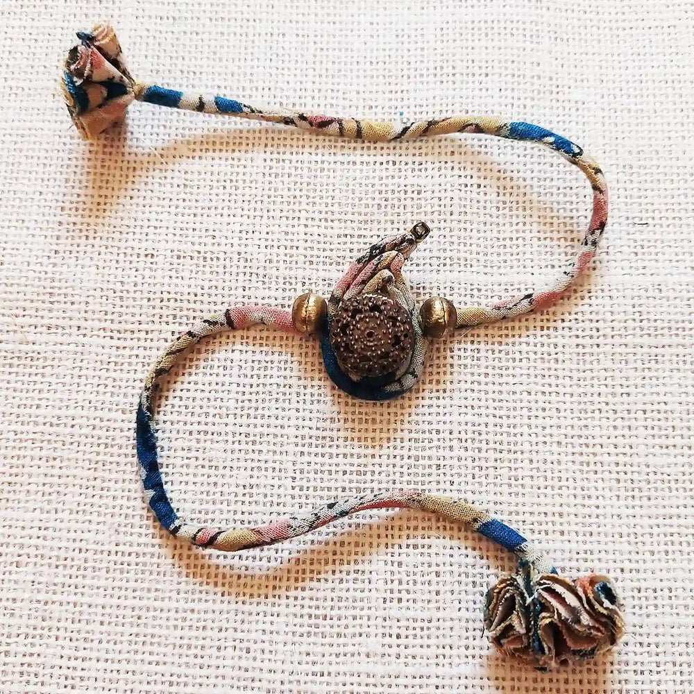 Handmade Dori Work Classic Ambi Bhaiya Bhabhi Rakhi With Roli Chawal Set Of 2 - Close-up Detail View
