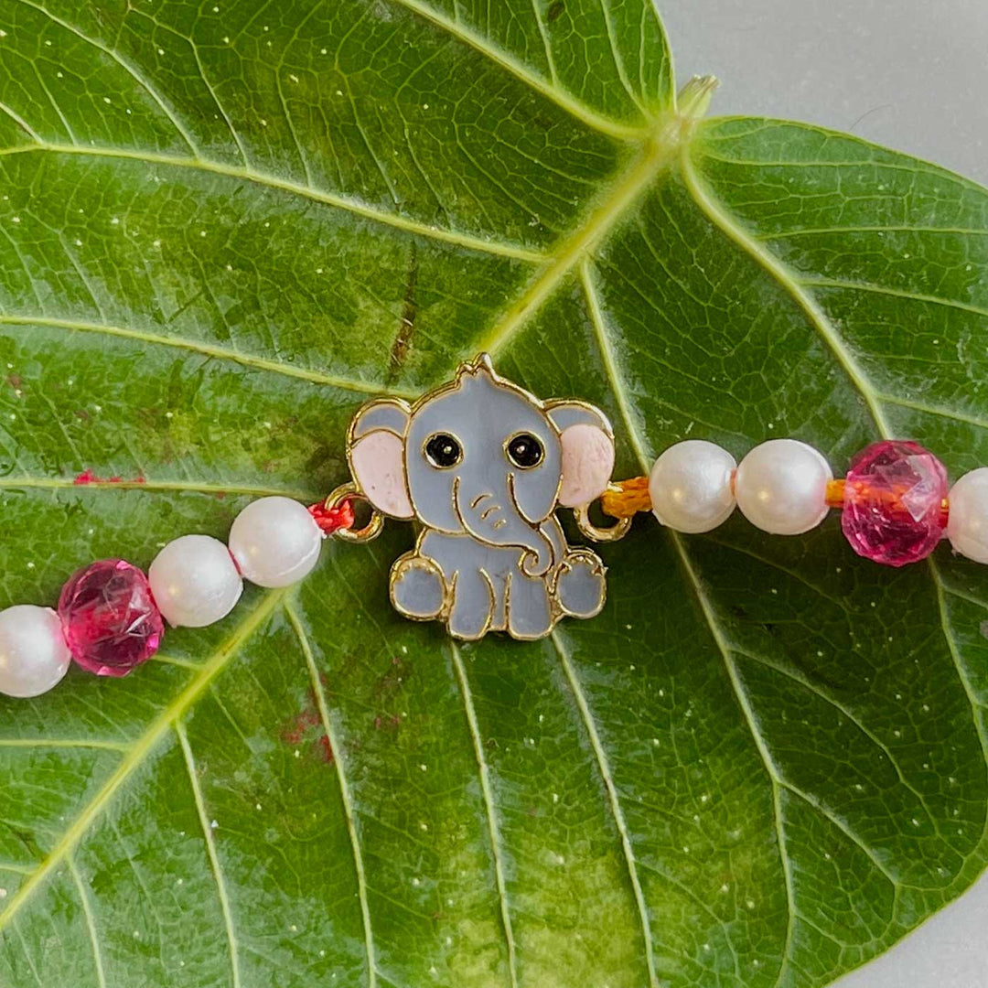 Handmade Elephant Design Metal Kids Rakhi - Close-up of Elephant Charm