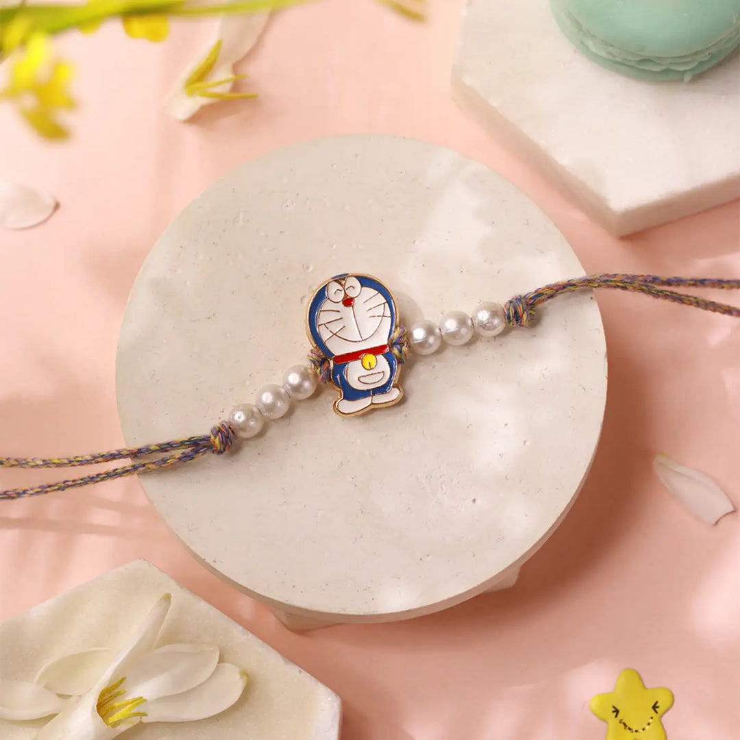 Handmade Doraemon Charm Kids Rakhi With Roli Chawal
