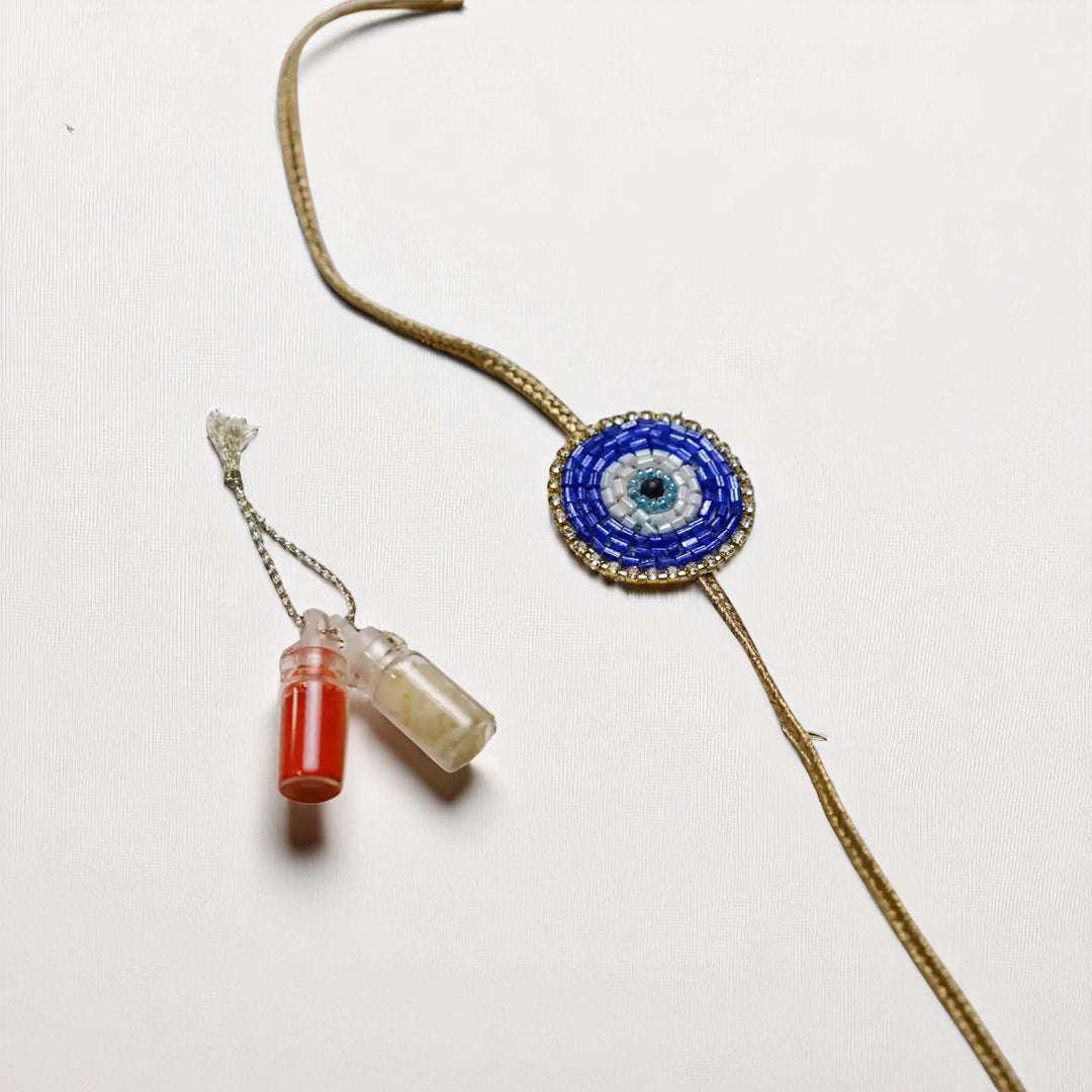 Handmade Beaded Evil Eye Bhaiya Bhabhi Rakhi With Roli Chawal Set Of 2 - Full View with Bottles
