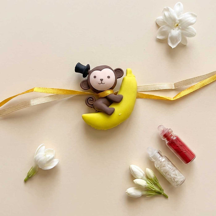 Engraved Little Monkey Rubber Charm Rakhi With Roli Chawal for Brother