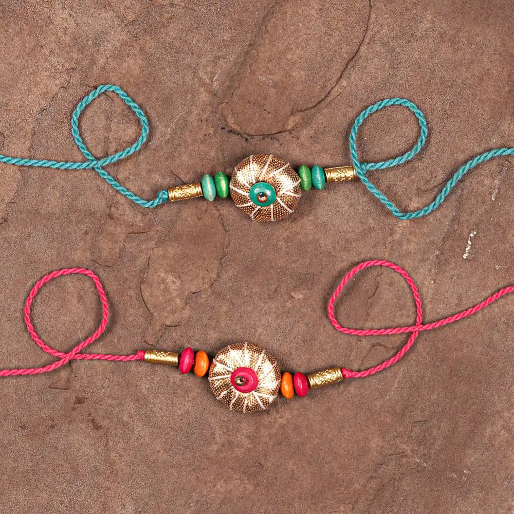 Handmade Gota Patti Blue And Pink Rakhi With Roli Chawal Set Of 2 - Flat Lay with Strings Extended
