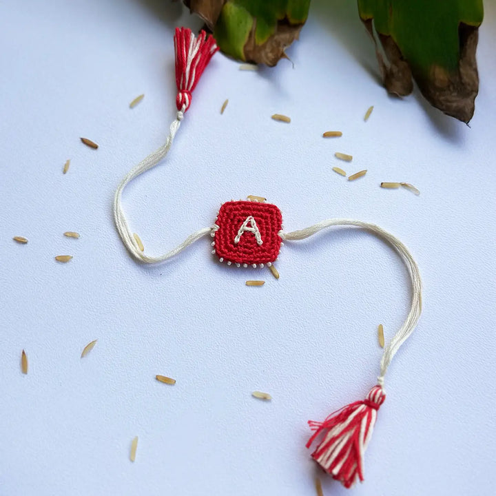 Personalized Handmade Crochet Red & White Initial Rakhi With Roli Chawal
