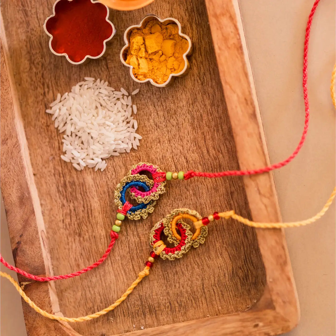 Handmade Crochet Bandhan Rakhi With Roli Chawal Set Of 2 - Decorative Threads with Ritual Items